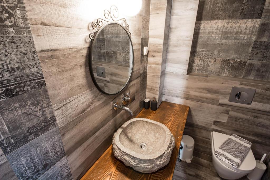 Kúpeľňa v ubytovaní Harmony Deluxe Villas