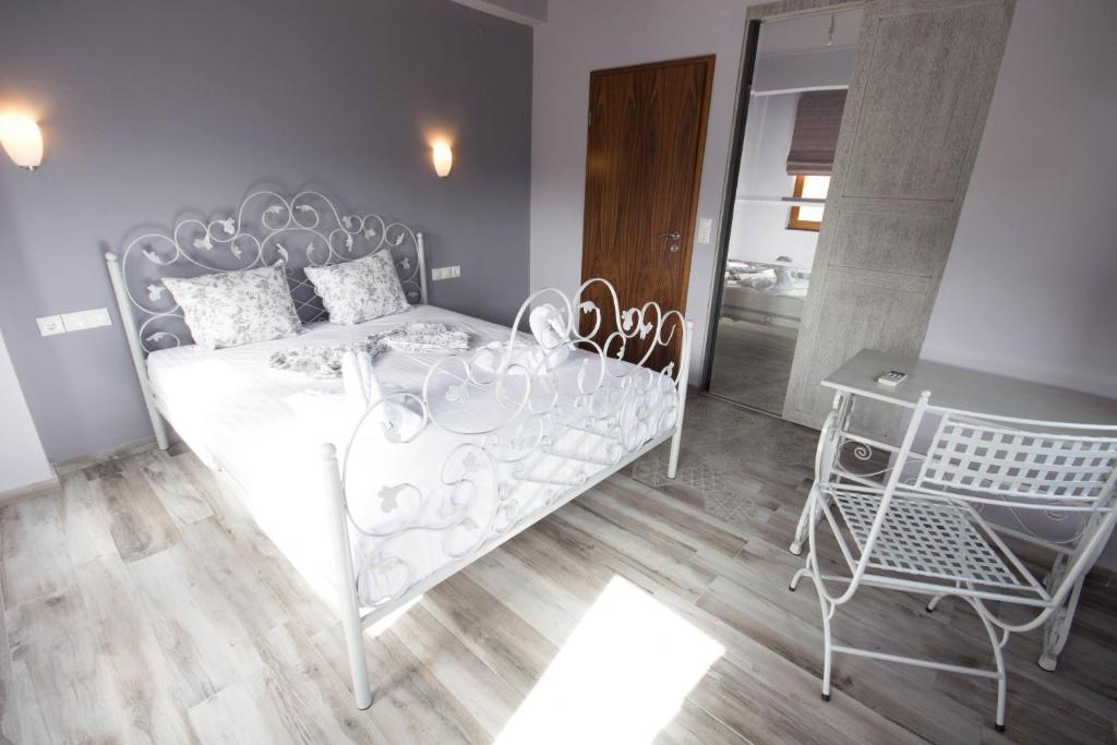 Posteľ alebo postele v izbe v ubytovaní Harmony Deluxe Villas