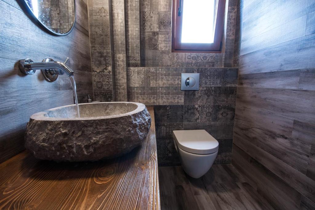 Kúpeľňa v ubytovaní Harmony Deluxe Villas