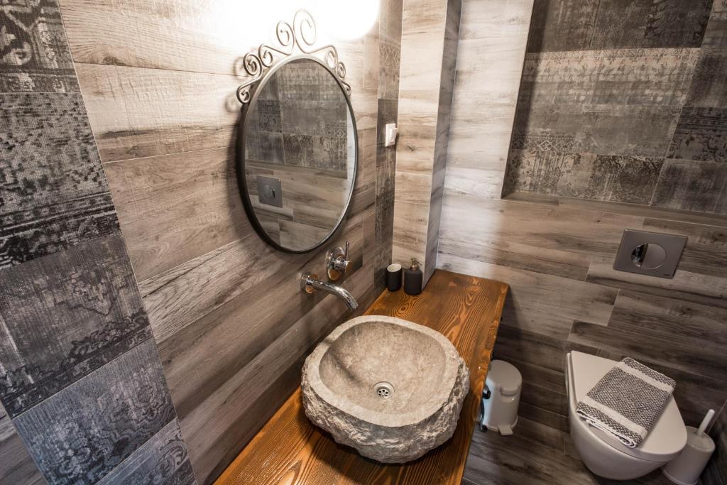 Kúpeľňa v ubytovaní Harmony Deluxe Villas