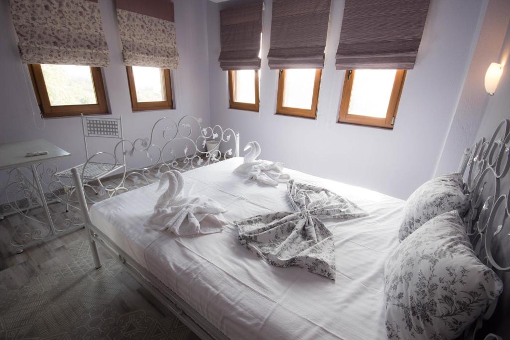Posteľ alebo postele v izbe v ubytovaní Harmony Deluxe Villas