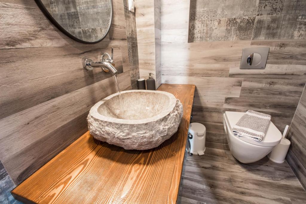 Kúpeľňa v ubytovaní Harmony Deluxe Villas