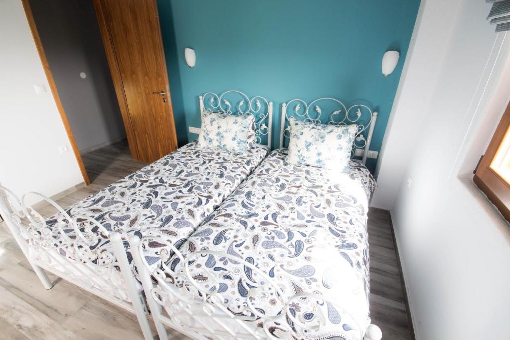Posteľ alebo postele v izbe v ubytovaní Harmony Deluxe Villas