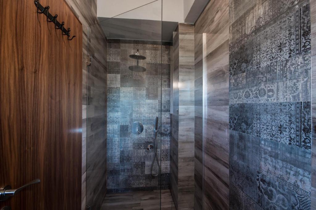 Kúpeľňa v ubytovaní Harmony Deluxe Villas