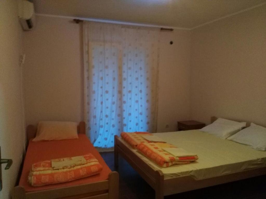 Cama o camas de una habitación en Apartmani Cuce