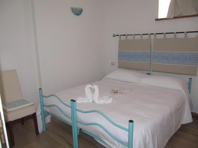 Postel nebo postele na pokoji v ubytování B&B I Limoni