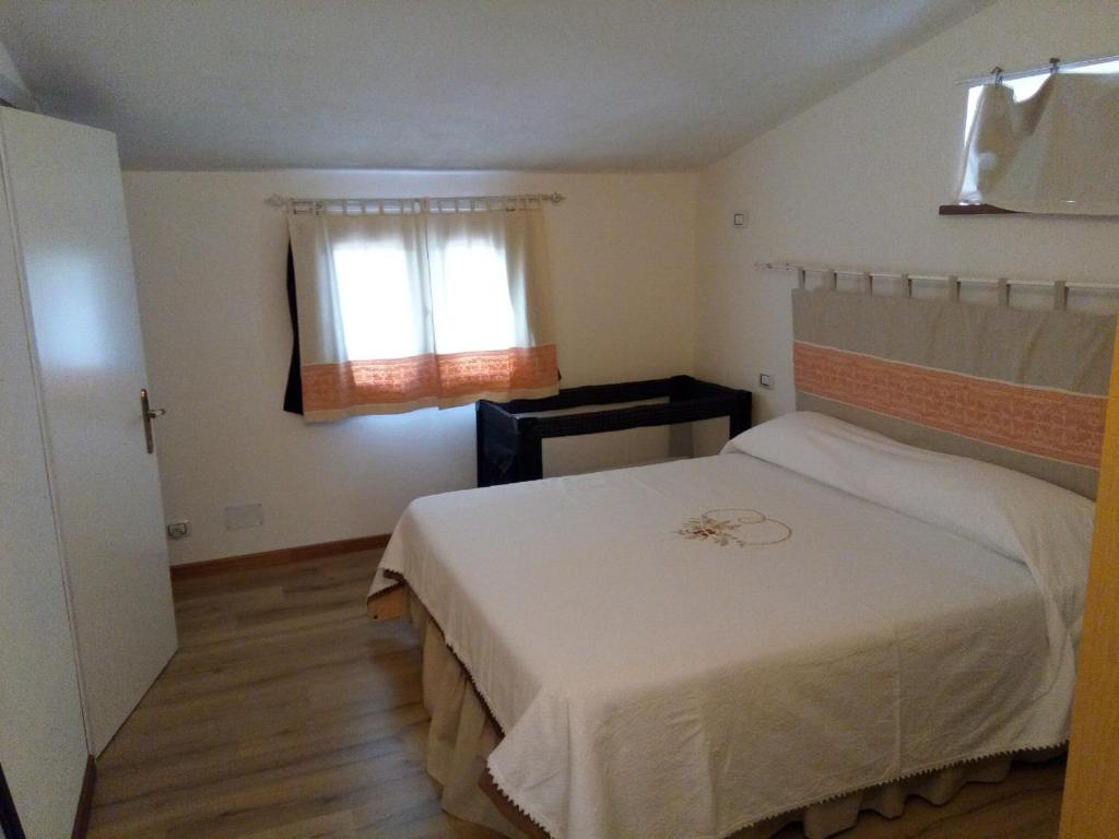 Postel nebo postele na pokoji v ubytování B&B I Limoni