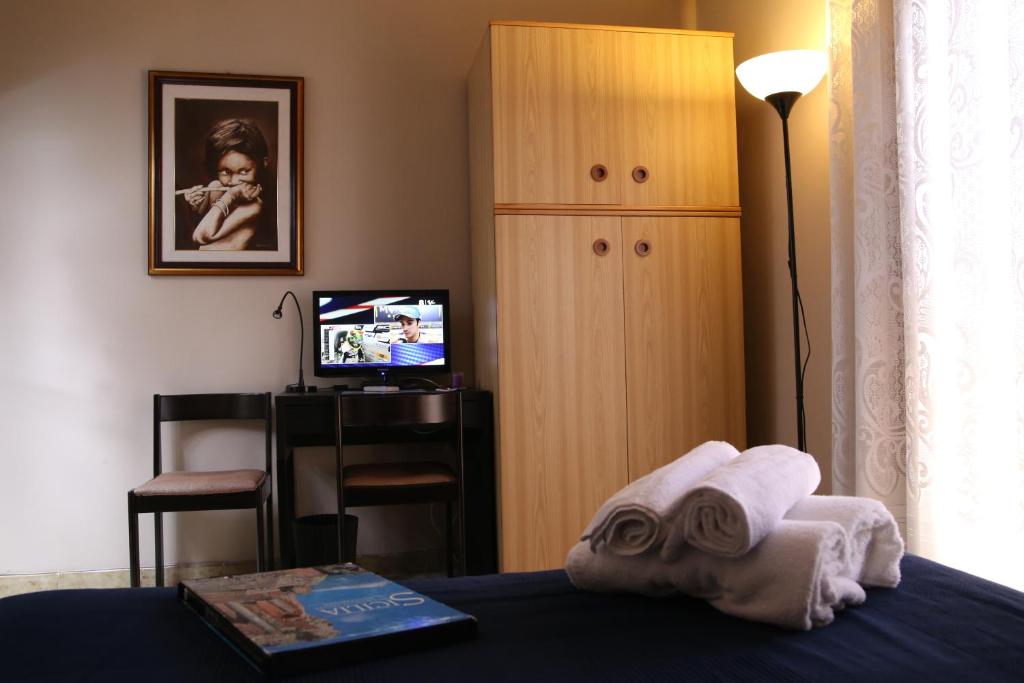 Postel nebo postele na pokoji v ubytování Terra Di Mare