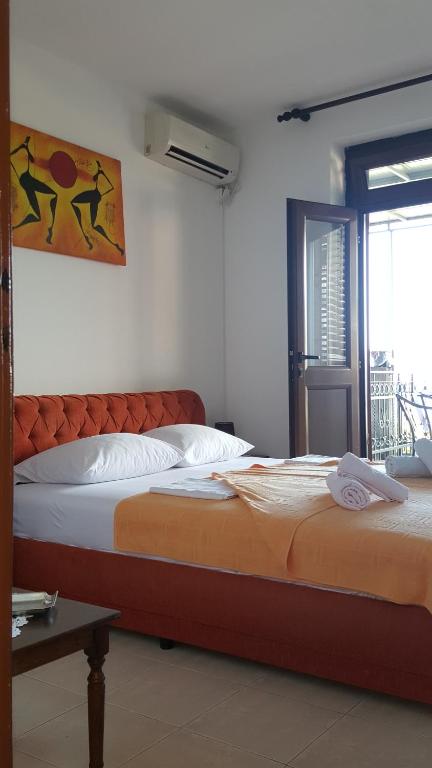 Postel nebo postele na pokoji v ubytování Guest House Ivo Jovanovic