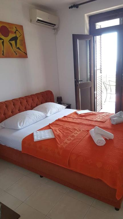 Postel nebo postele na pokoji v ubytování Guest House Ivo Jovanovic