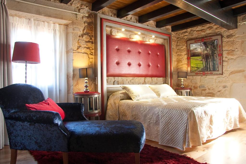 Postel nebo postele na pokoji v ubytování Posada La Torre de los Isla & Spa