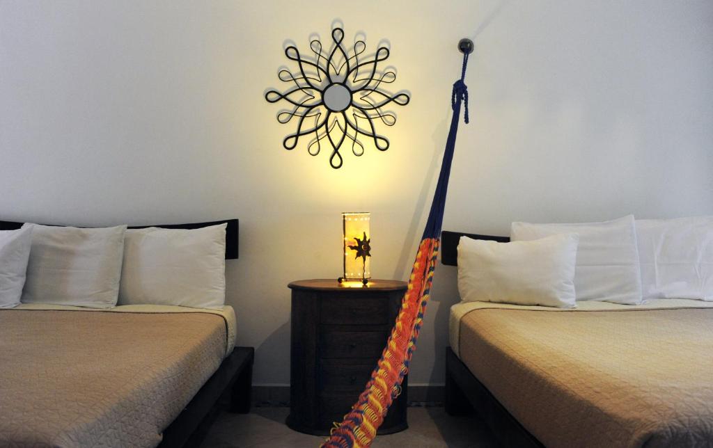 Postel nebo postele na pokoji v ubytování Casa Don Diego