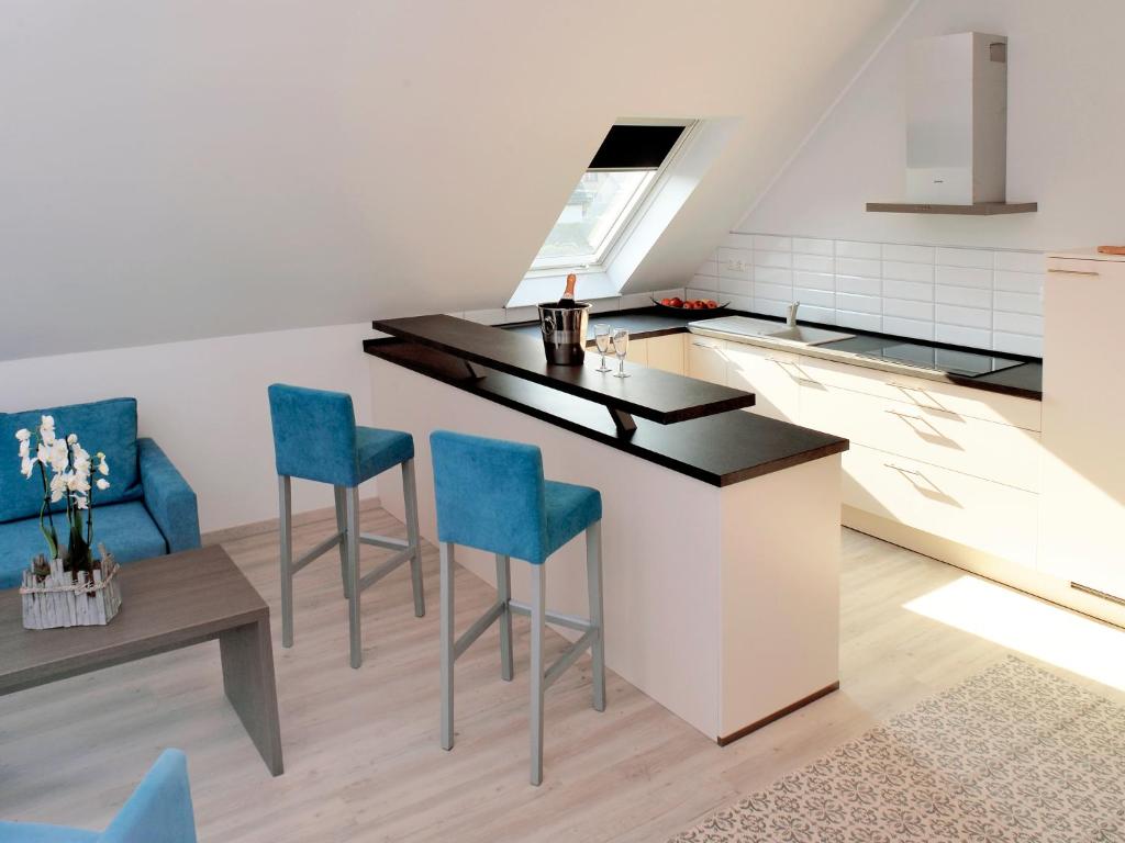 Kuchyň nebo kuchyňský kout v ubytování Hotel zur Eiche