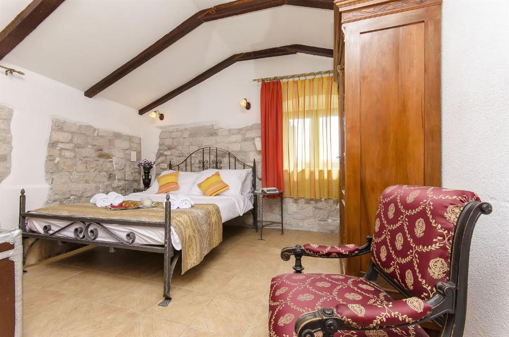 Postel nebo postele na pokoji v ubytování Palace Derossi