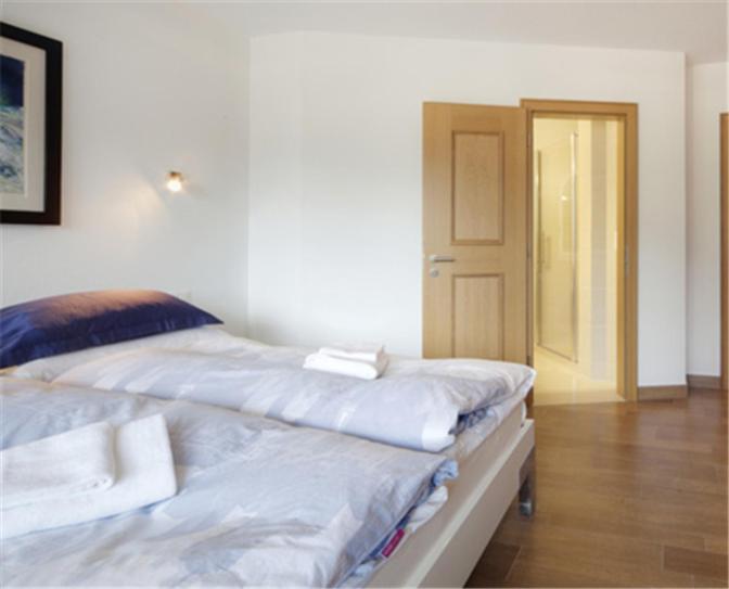 Postel nebo postele na pokoji v ubytování Residenz Ambassador B11