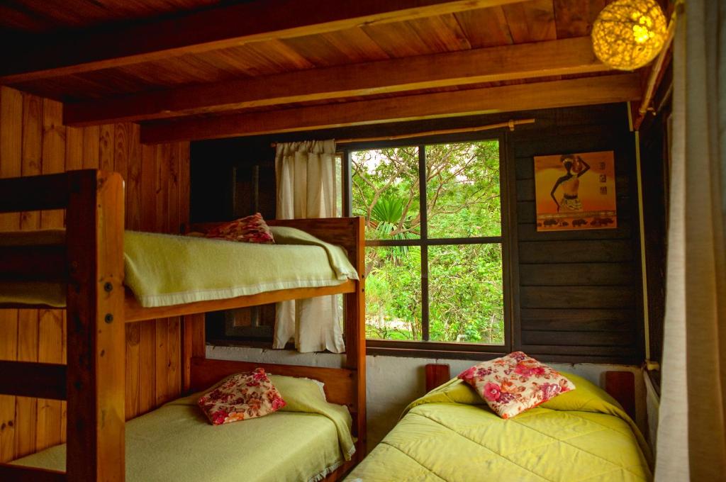 Postel nebo postele na pokoji v ubytování Casa de Piedra