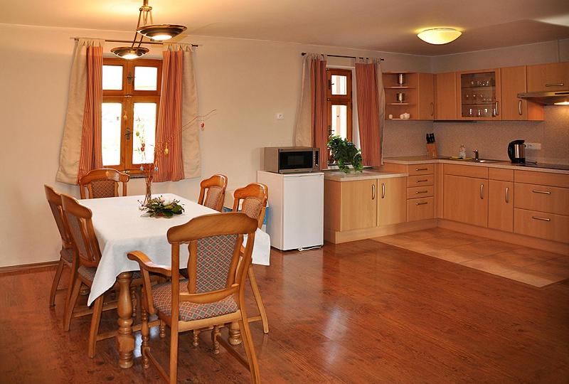 Kuchyň nebo kuchyňský kout v ubytování Apartmány Rosalka
