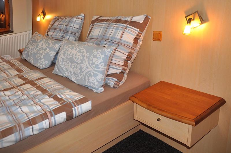 Postel nebo postele na pokoji v ubytování Apartmány Rosalka