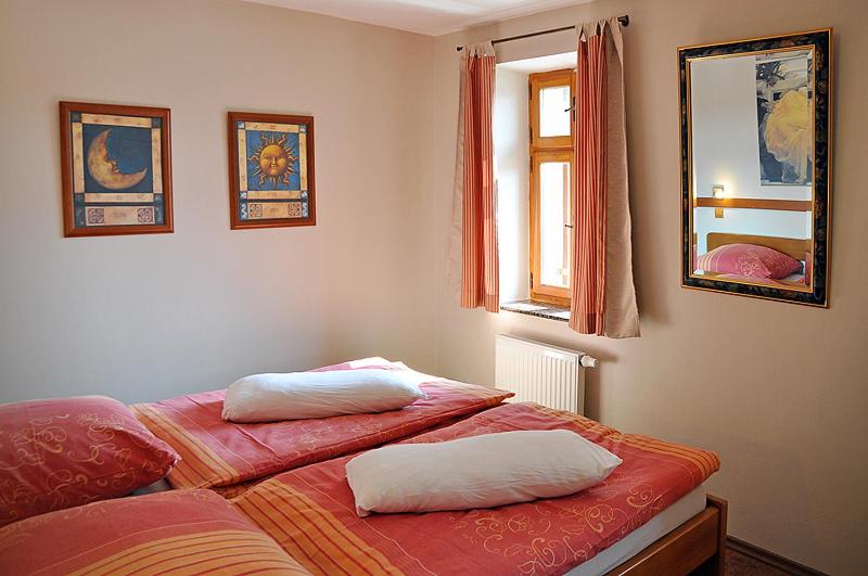 Postel nebo postele na pokoji v ubytování Apartmány Rosalka