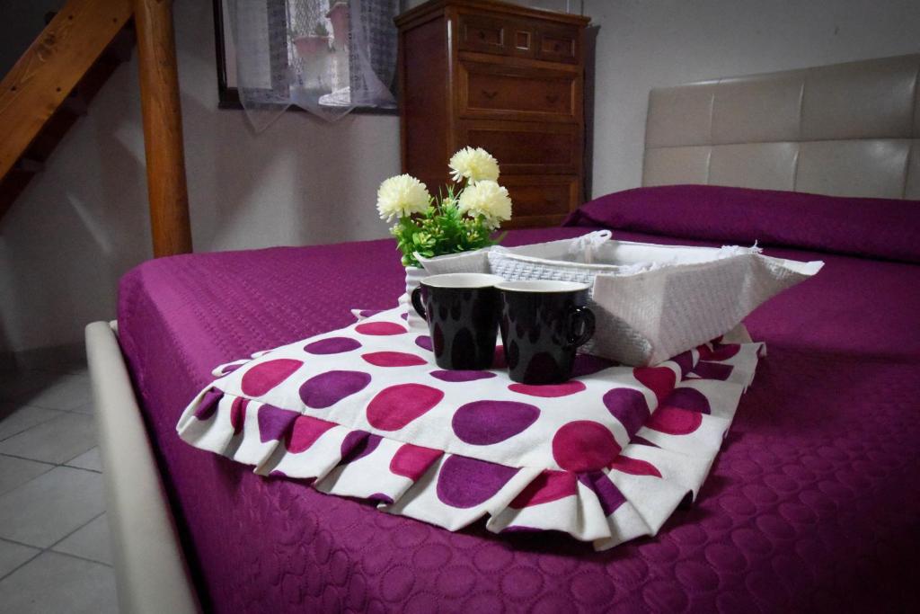 A bed or beds in a room at Venti di Mare