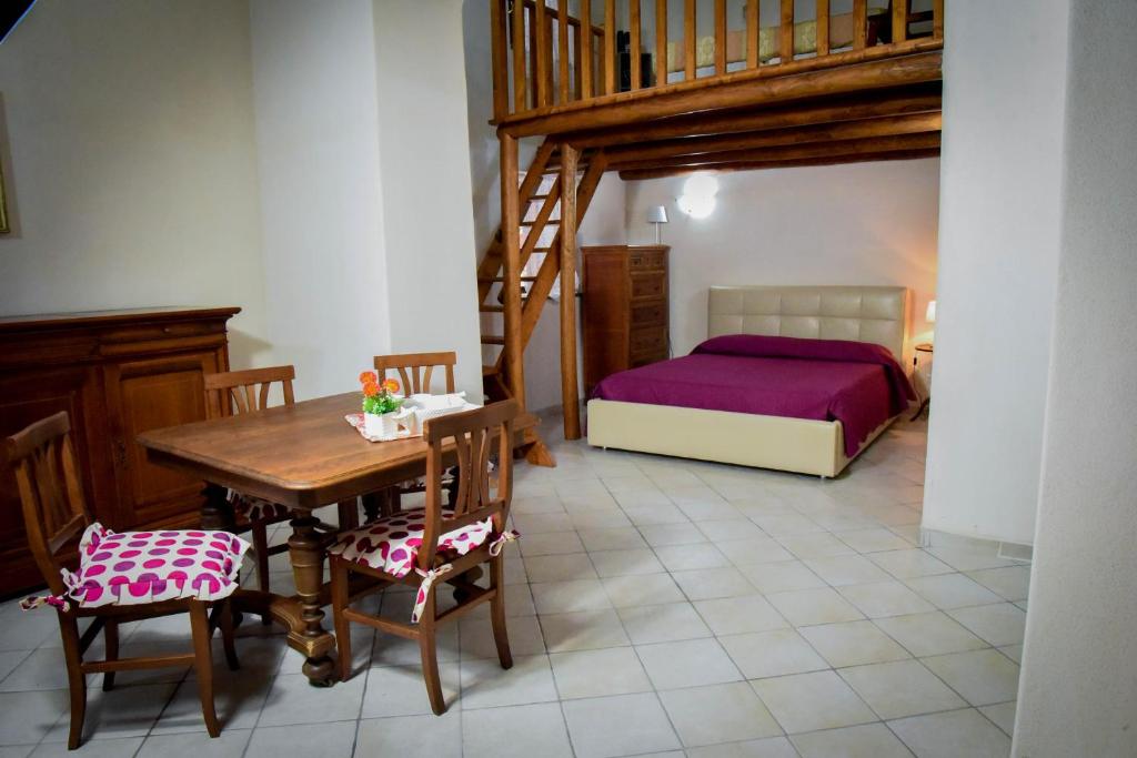 A bed or beds in a room at Venti di Mare