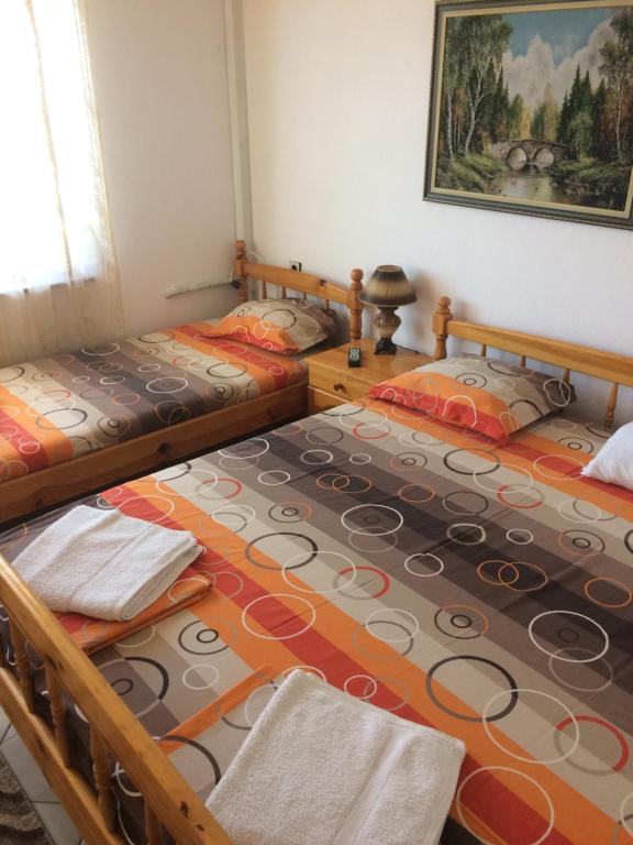 Postel nebo postele na pokoji v ubytování Vila Roza