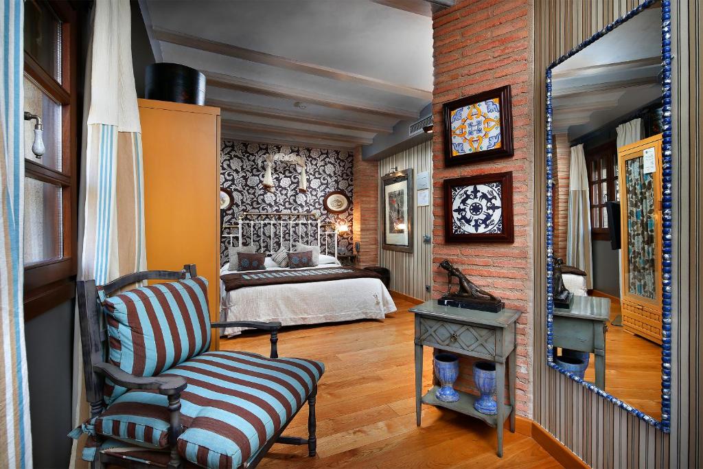 Postel nebo postele na pokoji v ubytování Hotel Boutique Maribel (Adult Only)