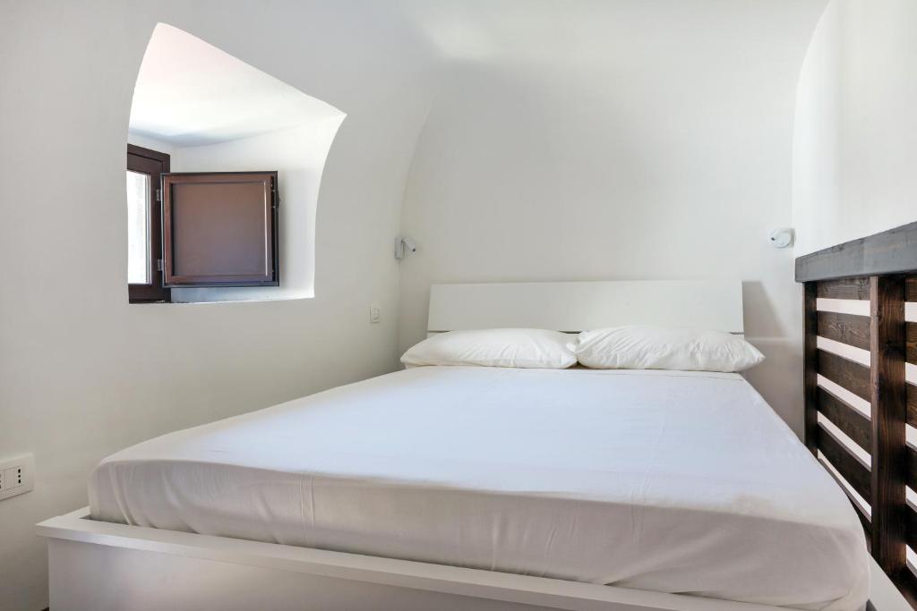 Łóżko lub łóżka w pokoju w obiekcie Alcalà Living Apartments