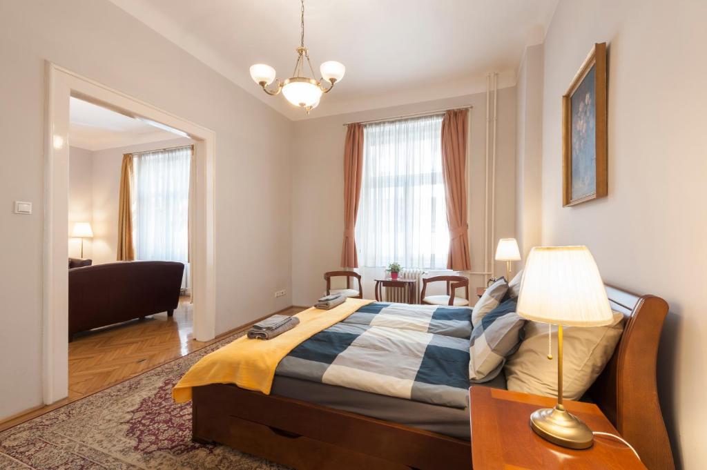 Postel nebo postele na pokoji v ubytování Liszt Ferenc Boutique Apartment
