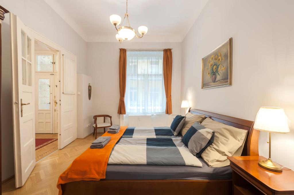 Postel nebo postele na pokoji v ubytování Liszt Ferenc Boutique Apartment