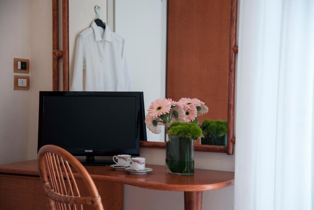 TV a/nebo společenská místnost v ubytování Hotel Gorini