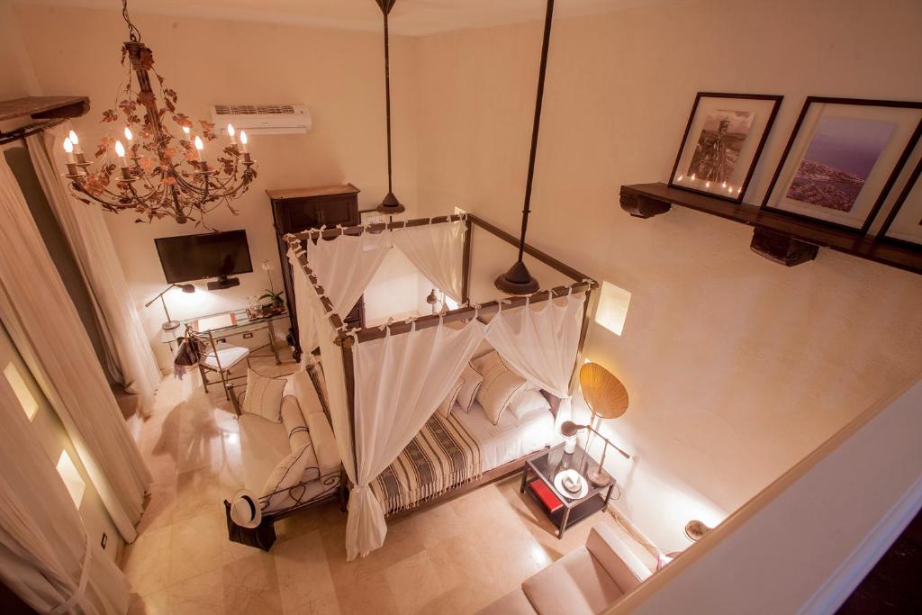 Postel nebo postele na pokoji v ubytování Casa de Alba Hotel Boutique