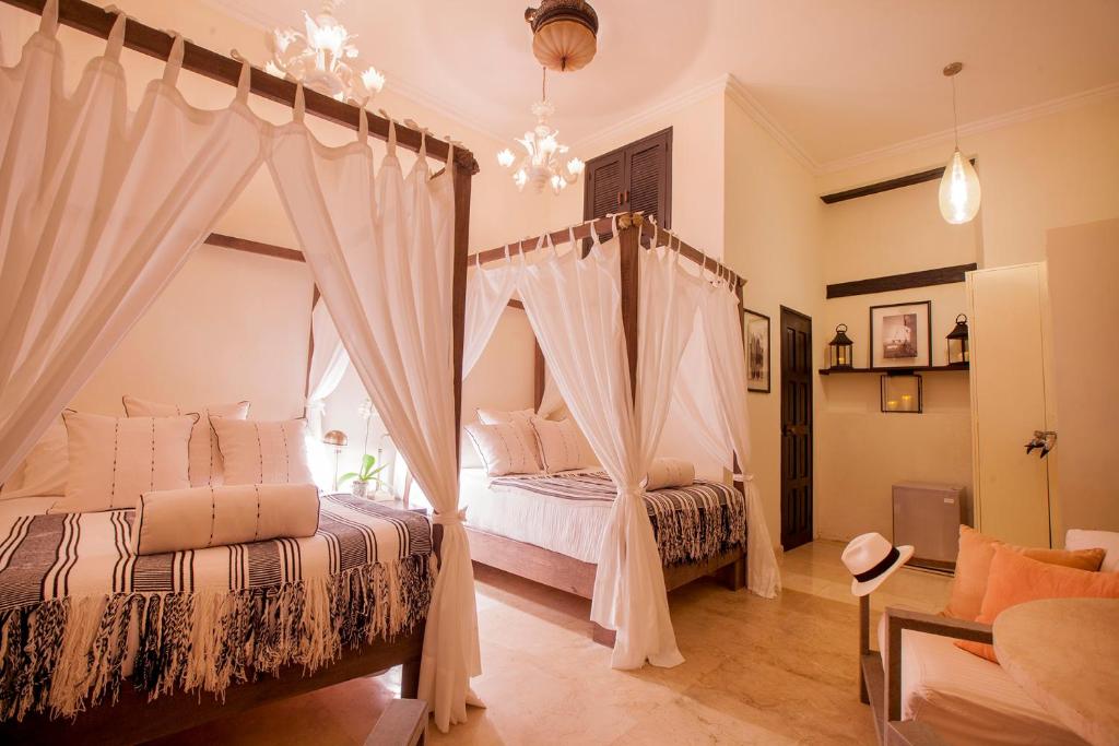 Postel nebo postele na pokoji v ubytování Casa de Alba Hotel Boutique