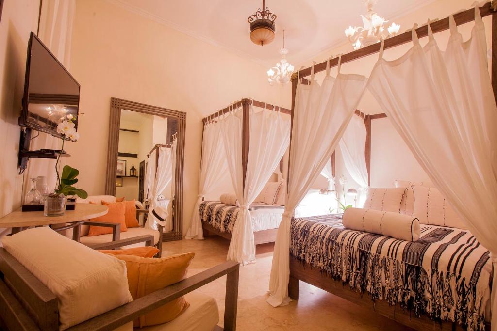 TV a/nebo společenská místnost v ubytování Casa de Alba Hotel Boutique