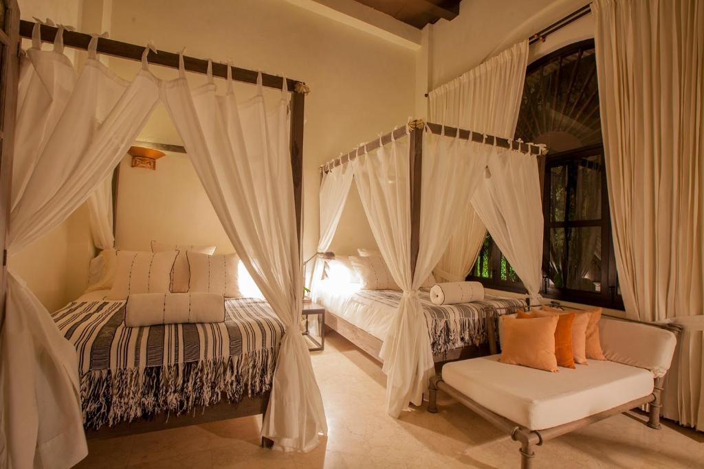 Postel nebo postele na pokoji v ubytování Casa de Alba Hotel Boutique