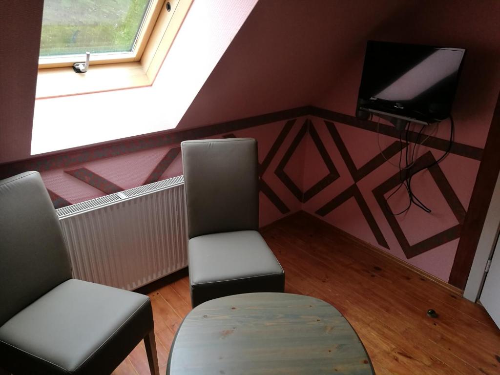 TV a/nebo společenská místnost v ubytování Bebru pirts