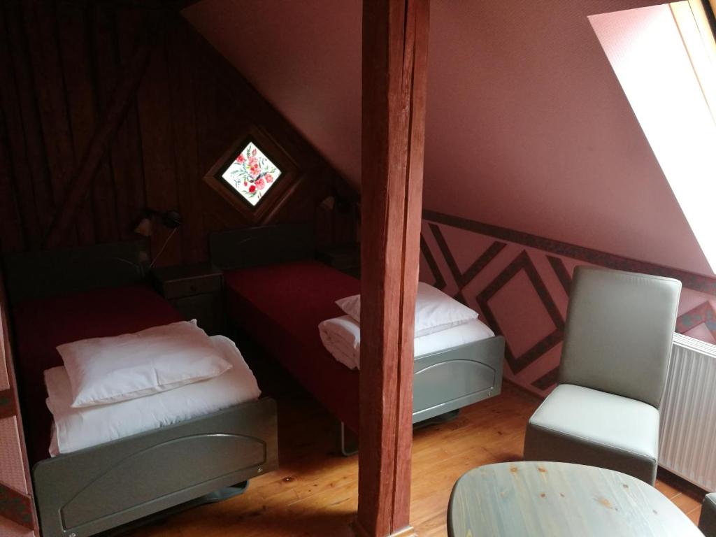 Postel nebo postele na pokoji v ubytování Bebru pirts