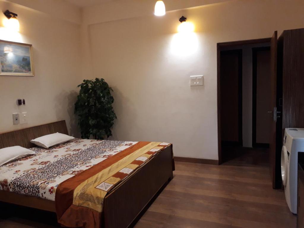 Postel nebo postele na pokoji v ubytování Bis-LIN Home Stay