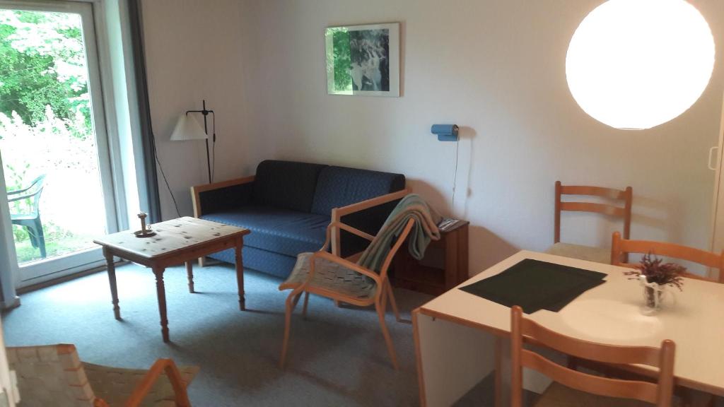 Posezení v ubytování Lyngbjerggaard Ferieboliger - B&B