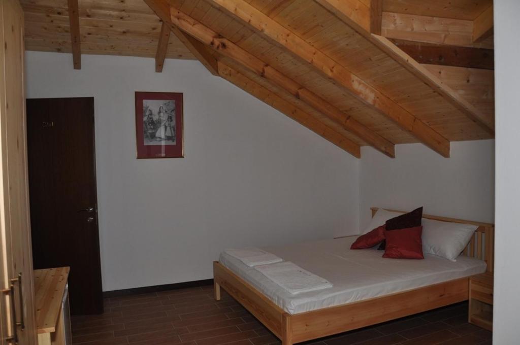 Ein Bett oder Betten in einem Zimmer der Unterkunft Hotel Marub