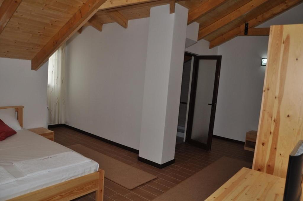 Ein Bett oder Betten in einem Zimmer der Unterkunft Hotel Marub