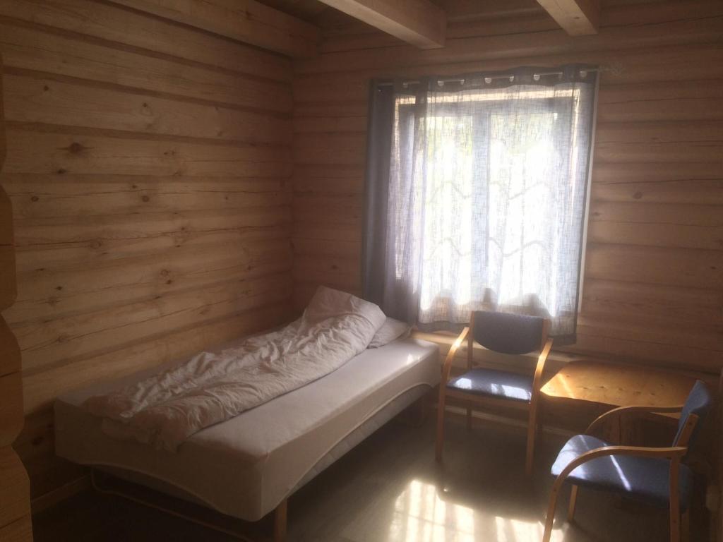 Postel nebo postele na pokoji v ubytování Grana Bryggeri