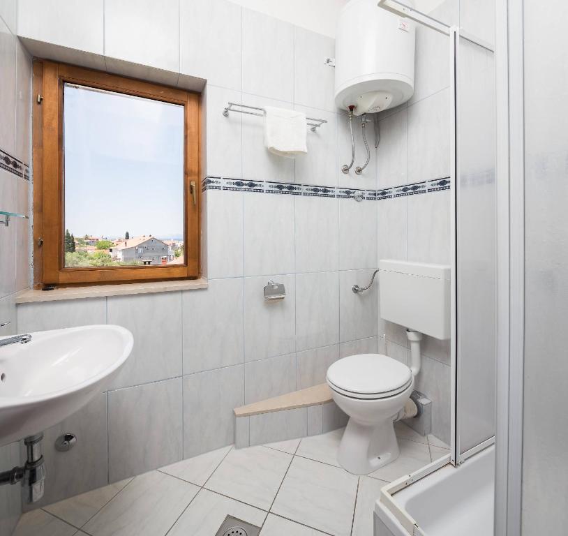 Kúpeľňa v ubytovaní Apartments Judita