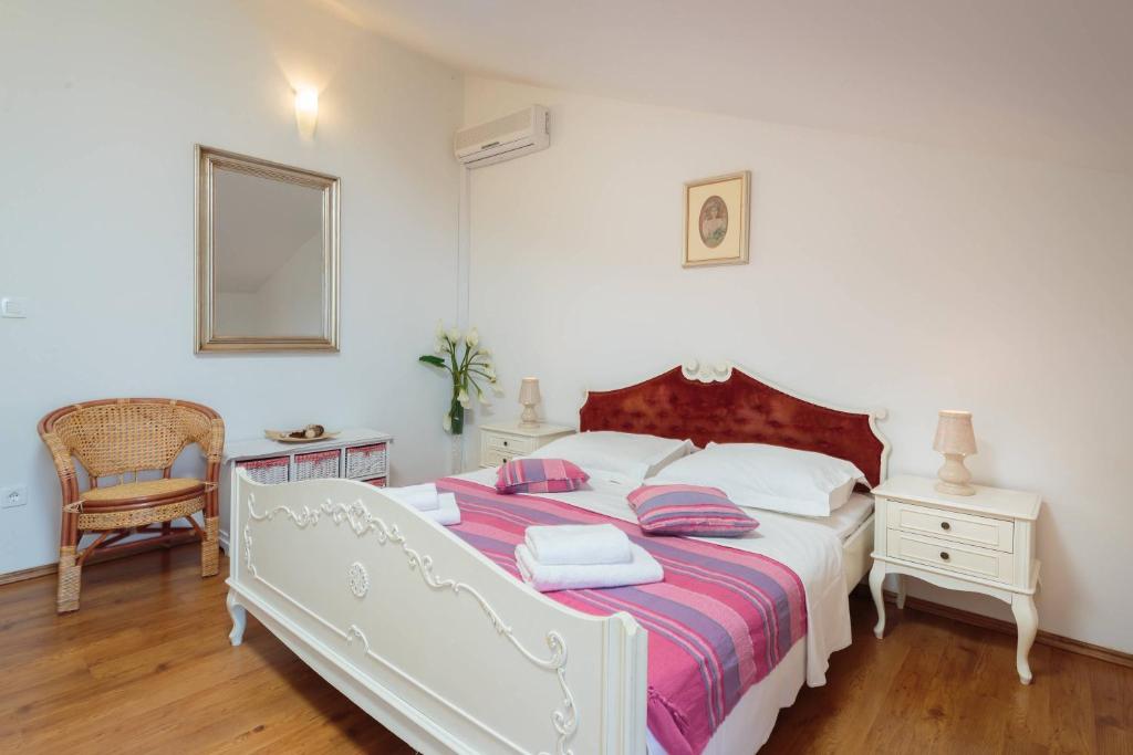 Posteľ alebo postele v izbe v ubytovaní Apartments Judita