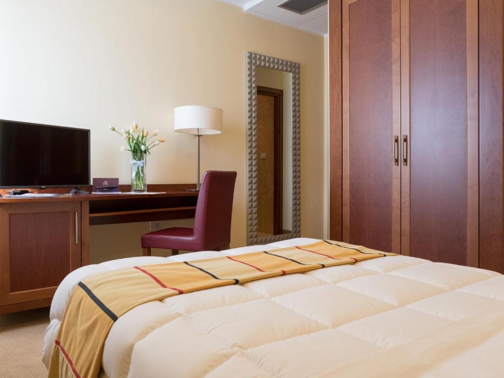 Postel nebo postele na pokoji v ubytování Appia Antica Hotel