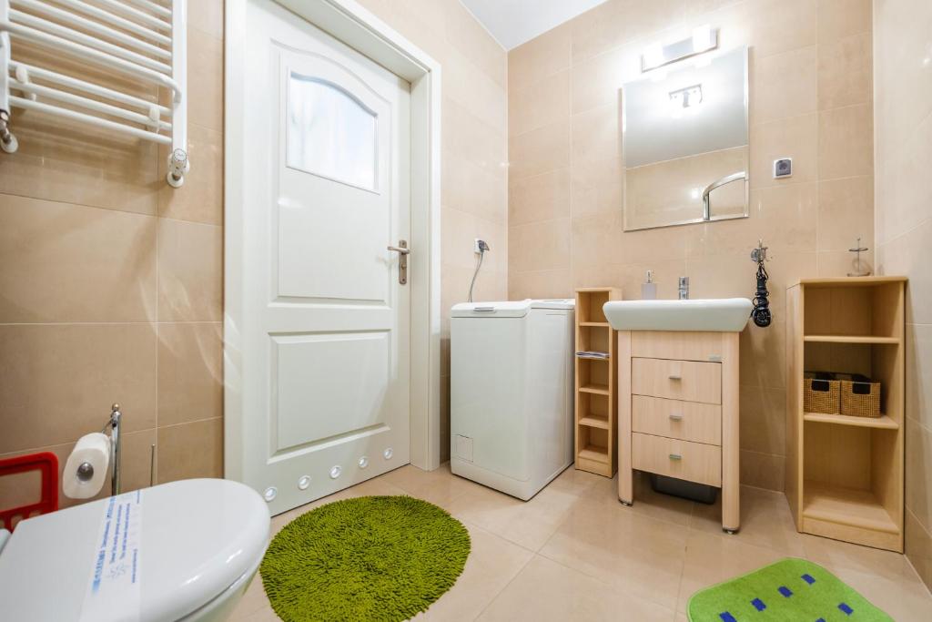 Kúpeľňa v ubytovaní Apartamenty Sun & Snow Kołobrzeg Jantar