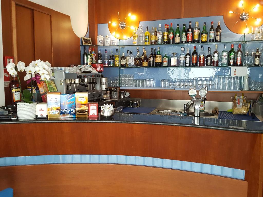 Nápoje v ubytování Hotel Saponi
