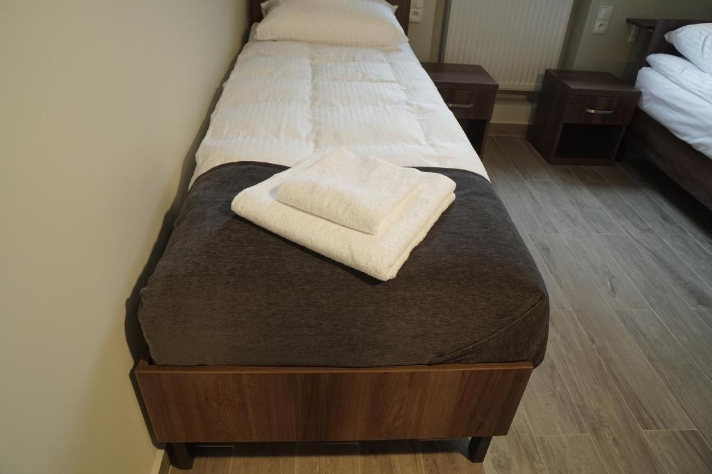 Postel nebo postele na pokoji v ubytování SmartMotel