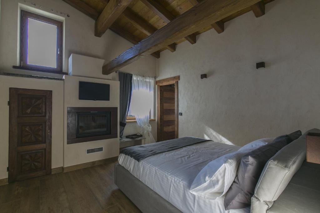 TV a/nebo společenská místnost v ubytování B&B Lo Matsòn