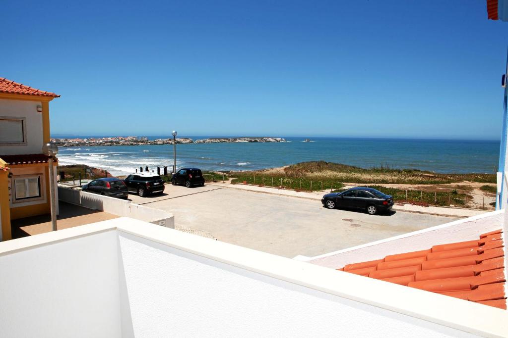 a view of the ocean from the roof of a house at Baleal 4 Surf II in Baleal